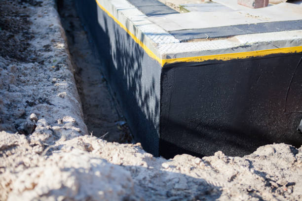 Professional Waterproofing technician working in Trinway, OH